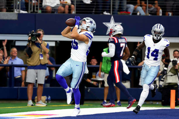 Dallas Cowboys linebacker Leighton Vander Esch celebrates a scoop-and-score touchdown during Sunday's win over the New England Patriots.